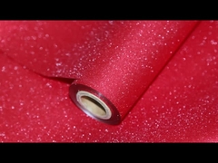 हमारे रेड ग्लिटर लैमिनेशन फिल्म की बोल्ड चमक के साथ अपने डिजाइन को प्रज्वलित करें!